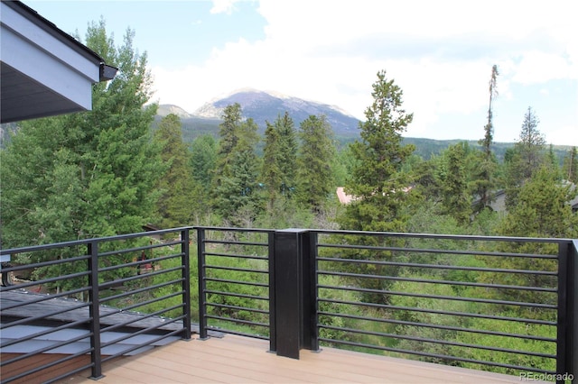 310 Creekside Aly Unit 4, Frisco, CO 80443 - deck with a mountain view and a wooded view