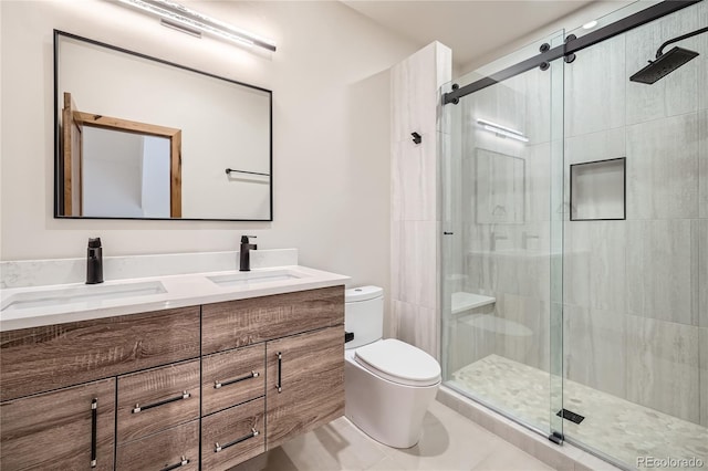 310 Creekside Aly Unit 4, Frisco, CO 80443 - bathroom featuring double vanity, a stall shower, and tile patterned flooring