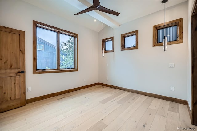 310 Creekside Aly Unit 4, Frisco, CO 80443 - spare room with healthy amount of natural light, a ceiling fan, light wood-type flooring, and lofted ceiling