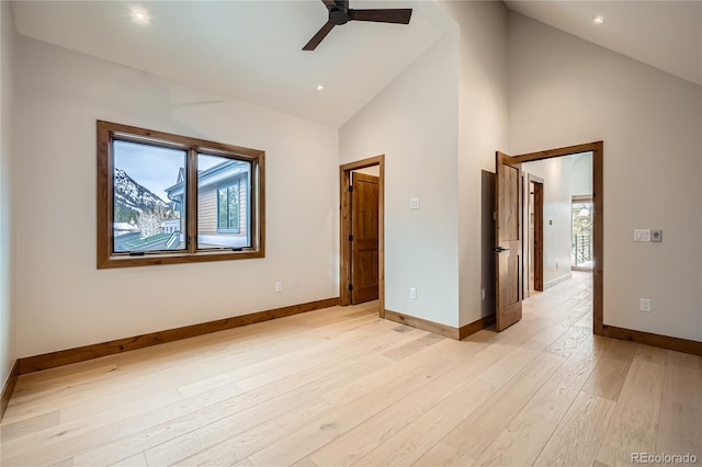 310 Creekside Aly Unit 4, Frisco, CO 80443 - empty room with high vaulted ceiling, light wood finished floors, a ceiling fan, and recessed lighting
