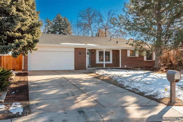 ranch-style home featuring a garage