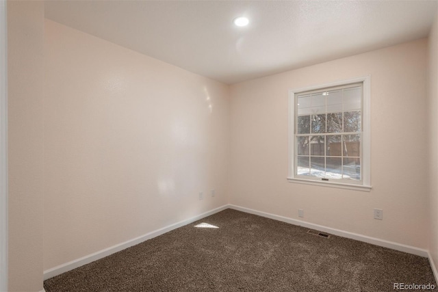 unfurnished room featuring carpet floors