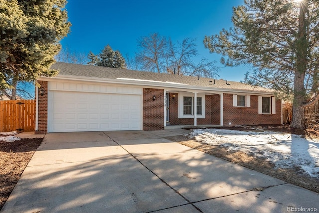 single story home featuring a garage