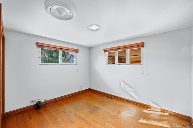 3131 S Washington St, Englewood, CO 80113 - unfurnished room featuring baseboards and wood finished floors