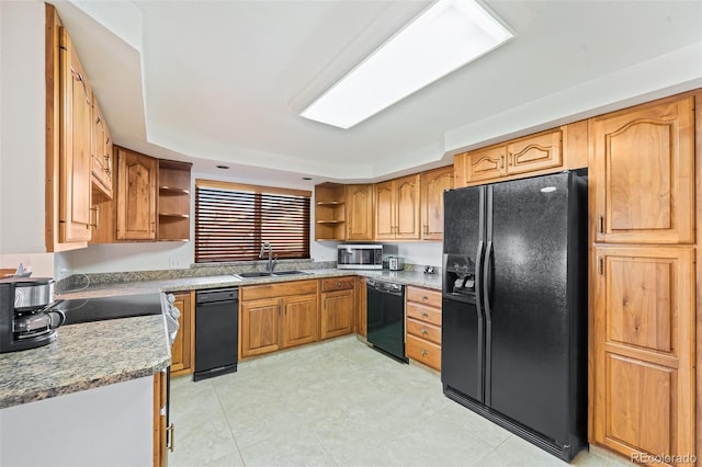 3131 S Washington St, Englewood, CO 80113 - kitchen featuring black appliances, open shelves, and brown cabinetry