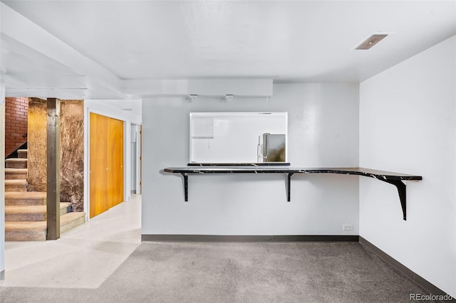 3131 S Washington St, Englewood, CO 80113 - kitchen featuring baseboards