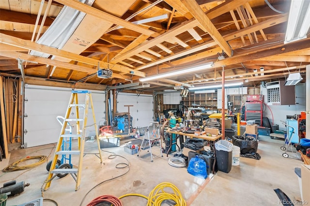 3131 S Washington St, Englewood, CO 80113 - garage with a garage door opener and a workshop area