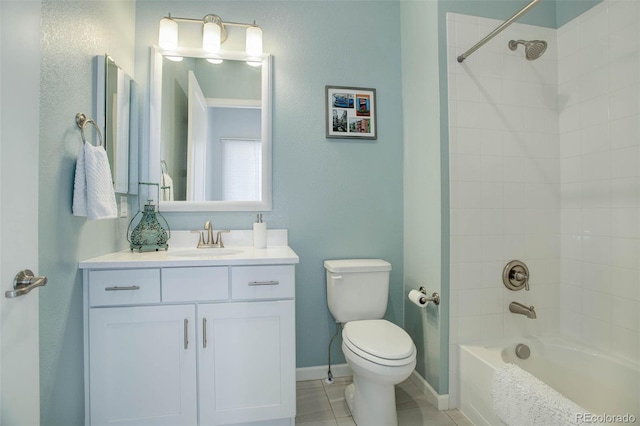 full bath featuring vanity, baseboards, tile patterned flooring, shower / bathing tub combination, and toilet