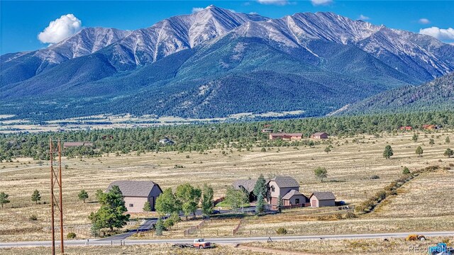 property view of mountains featuring a rural view