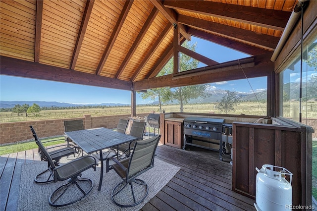 deck with a mountain view and a rural view