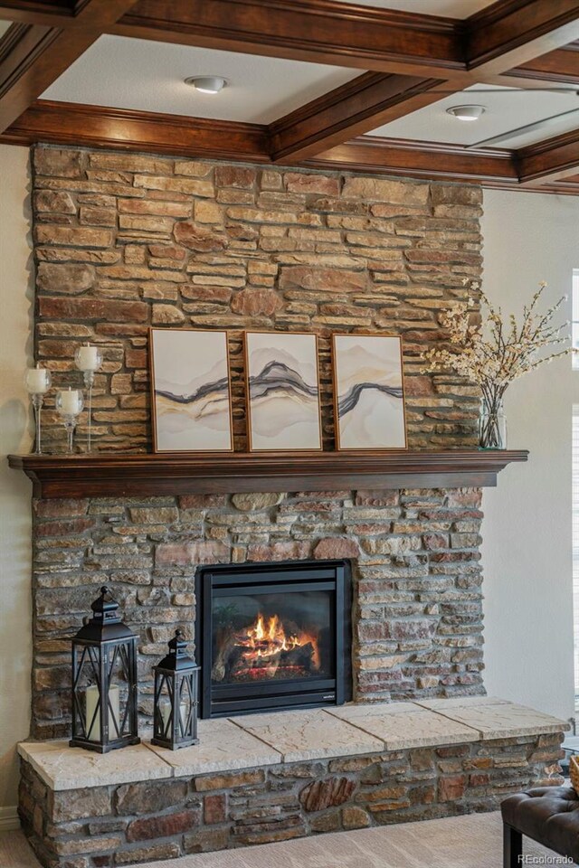 27290 E Nova Cir, Aurora, CO 80016 - detailed view of beam ceiling, ornamental molding, and a stone fireplace