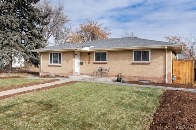 view of front of home with a front lawn