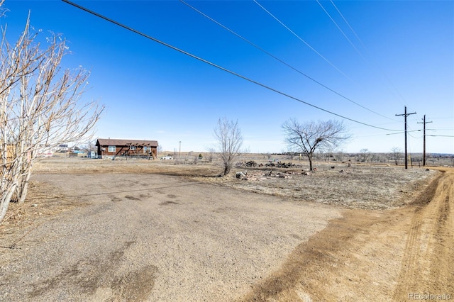 view of yard featuring a rural view