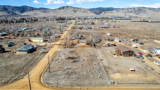 bird's eye view with a mountain view