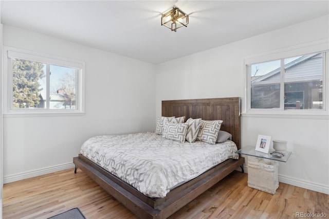 bedroom featuring light wood-type flooring