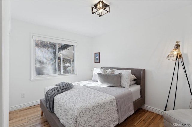 bedroom featuring hardwood / wood-style flooring