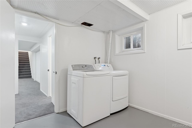 laundry area featuring washing machine and dryer