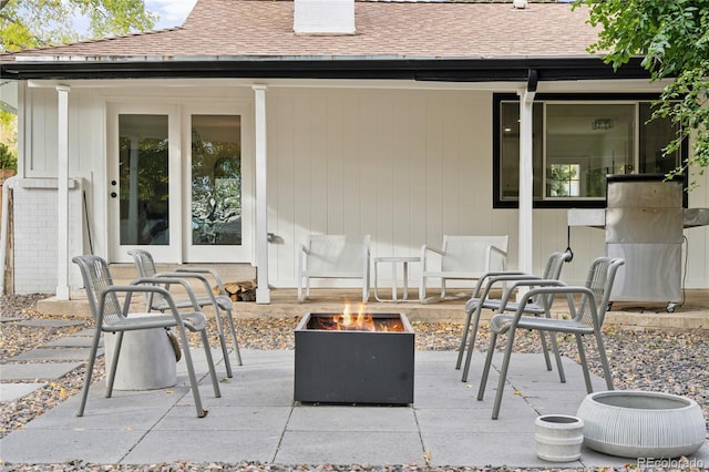 view of patio / terrace featuring a fire pit