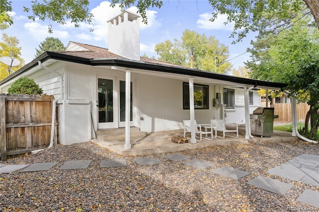 back of property featuring a patio area