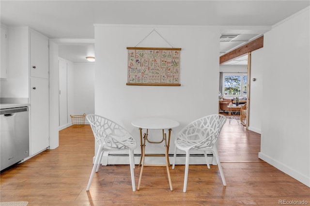 505 S Roosevelt Rd, Lafayette, CO 80026 - dining room with light wood finished floors, a baseboard radiator, and baseboards