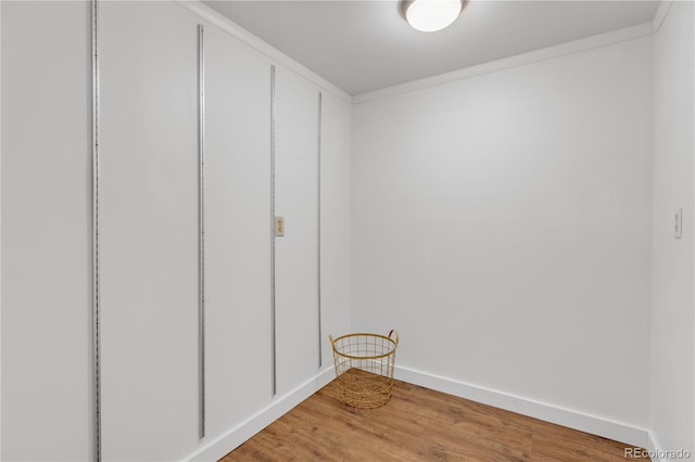 505 S Roosevelt Rd, Lafayette, CO 80026 - unfurnished bedroom with light wood finished floors, baseboards, and ornamental molding