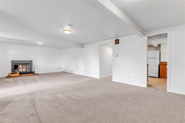 505 S Roosevelt Rd, Lafayette, CO 80026 - unfurnished living room with light colored carpet, a glass covered fireplace, baseboards, and a baseboard radiator