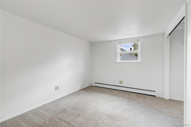 505 S Roosevelt Rd, Lafayette, CO 80026 - unfurnished bedroom with a baseboard radiator and carpet floors