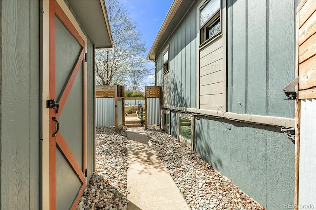 505 S Roosevelt Rd, Lafayette, CO 80026 - view of side of property featuring board and batten siding and a gate
