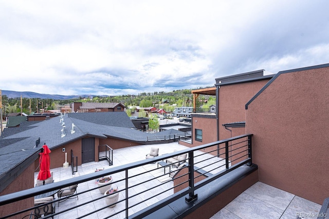 balcony featuring a mountain view