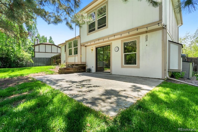 6544 Alkire Ct, Arvada, CO 80004 - rear view of property with a patio area