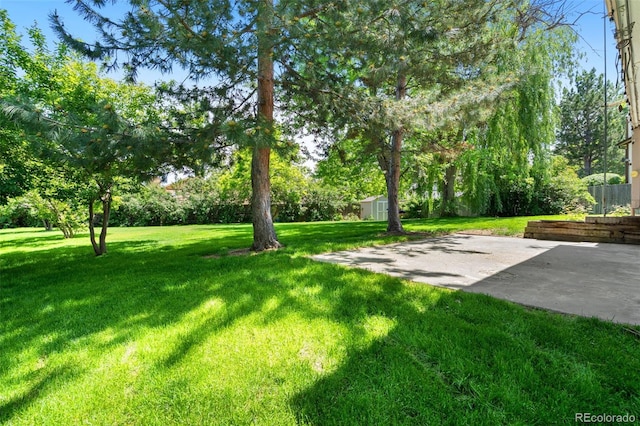 6544 Alkire Ct, Arvada, CO 80004 - view of yard featuring a patio