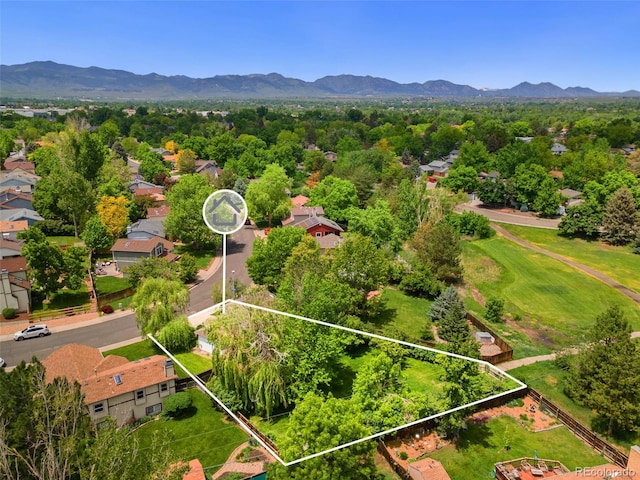 6544 Alkire Ct, Arvada, CO 80004 - aerial view of residential area featuring property parcel outlined and mountains