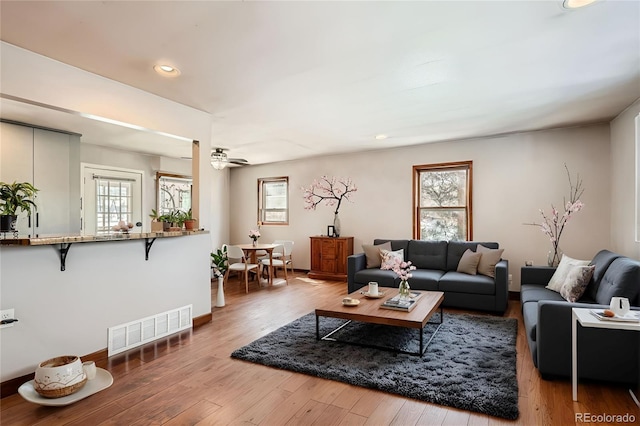 41 Yew Ln, Bailey, CO 80421 - living room with a ceiling fan, wood finished floors, baseboards, visible vents, and recessed lighting