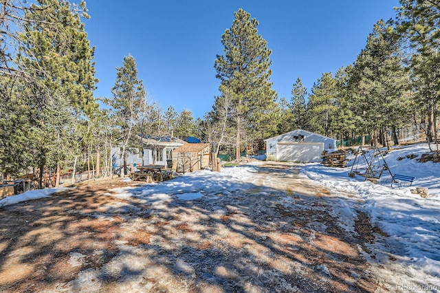 41 Yew Ln, Bailey, CO 80421 - view of front of property featuring an outdoor structure and a detached garage