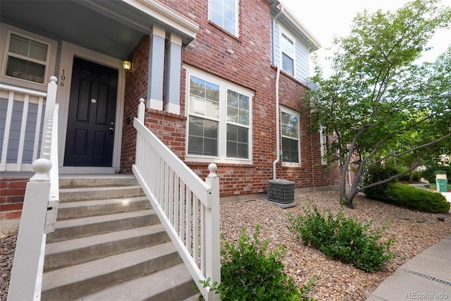 property entrance with central AC unit