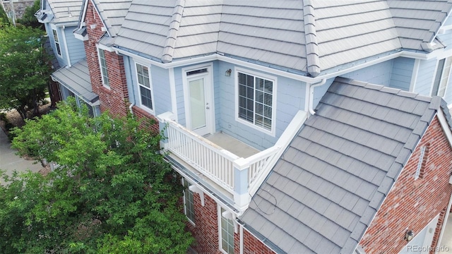 view of property exterior with a balcony