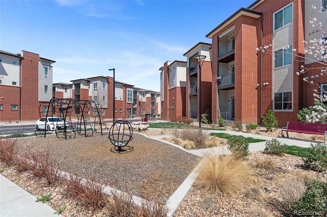 view of home's community with a residential view and playground community