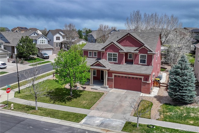 craftsman-style home featuring an attached garage, a residential view, fence, a shingled roof, and concrete driveway