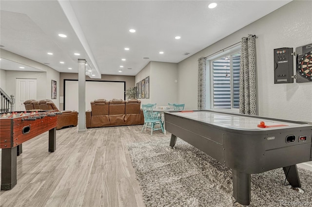 playroom with wood finished floors and recessed lighting