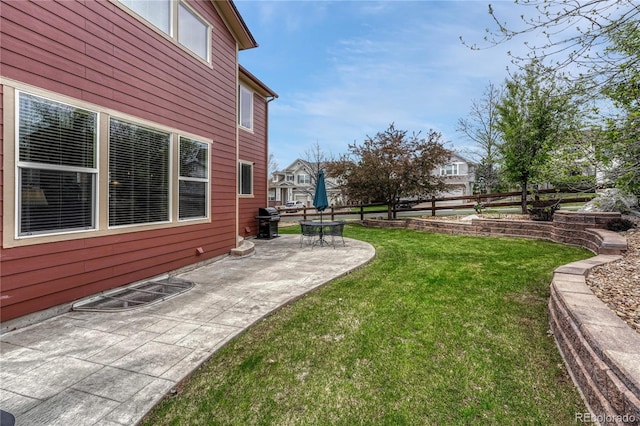 view of yard with a patio area and fence