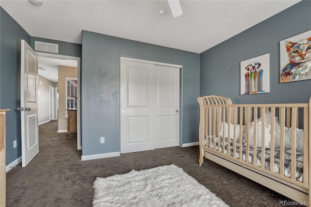22965 Allendale Ave, Parker, CO 80138 - carpeted bedroom featuring a nursery area, a closet, and a ceiling fan