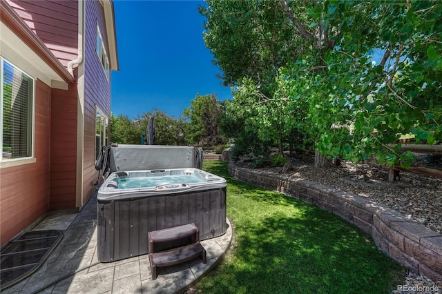 22965 Allendale Ave, Parker, CO 80138 - view of grassy yard with a hot tub and a patio