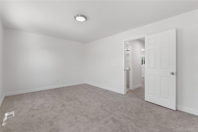 1705 Cathay Ct, Aurora, CO 80011 - carpeted spare room featuring baseboards