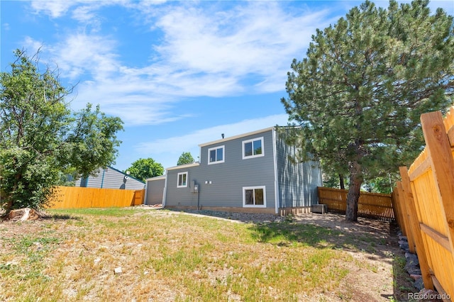 1705 Cathay Ct, Aurora, CO 80011 - rear view of house with a fenced backyard