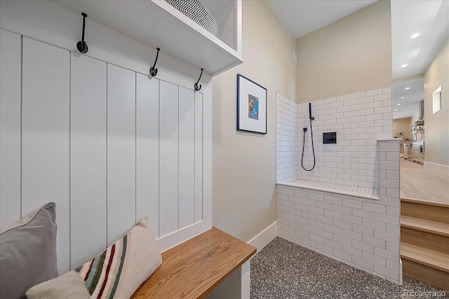 bathroom featuring tiled shower