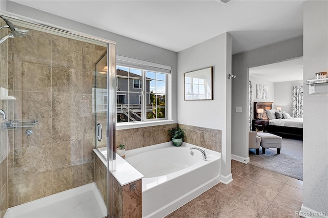 bathroom with shower with separate bathtub and tile patterned floors