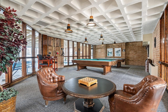 game room featuring visible vents, coffered ceiling, brick wall, pool table, and carpet