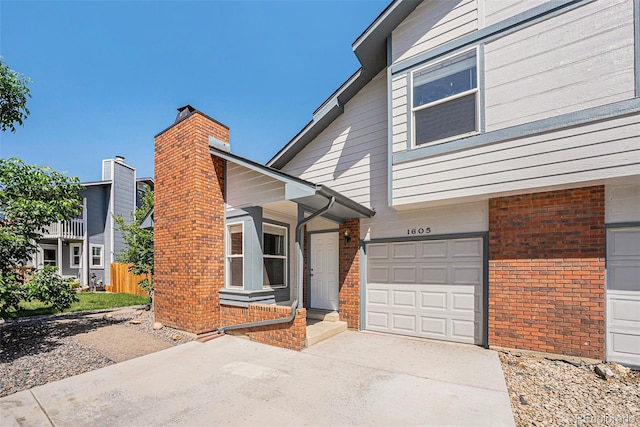 view of front of property with a garage