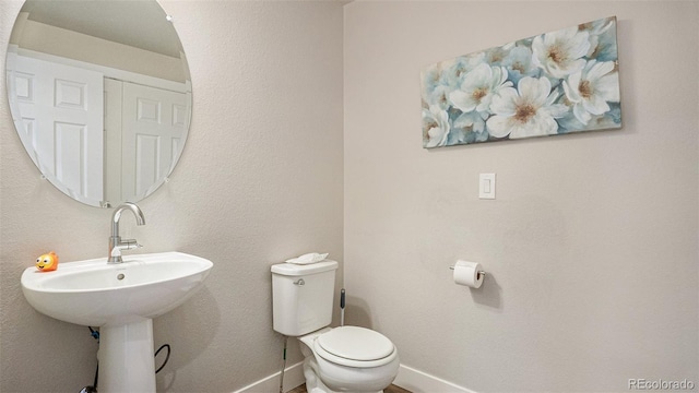 16231 E Warner Pl, Denver, CO 80239 - half bath featuring baseboards
