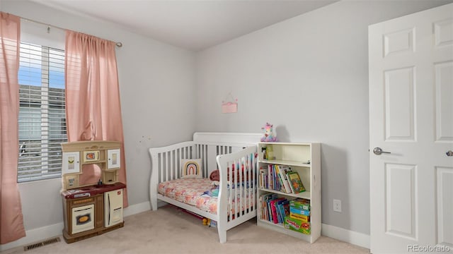 16231 E Warner Pl, Denver, CO 80239 - bedroom featuring carpet floors and baseboards